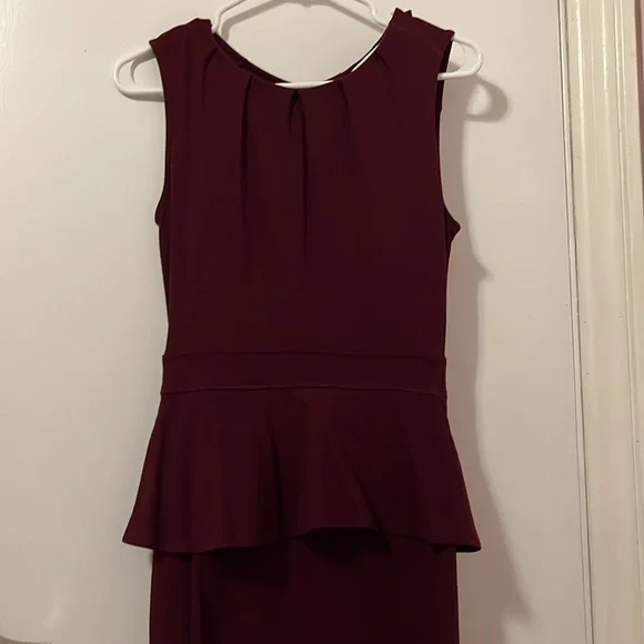 3/$20. Burgundy Peplum Dress - Picture 1 of 9